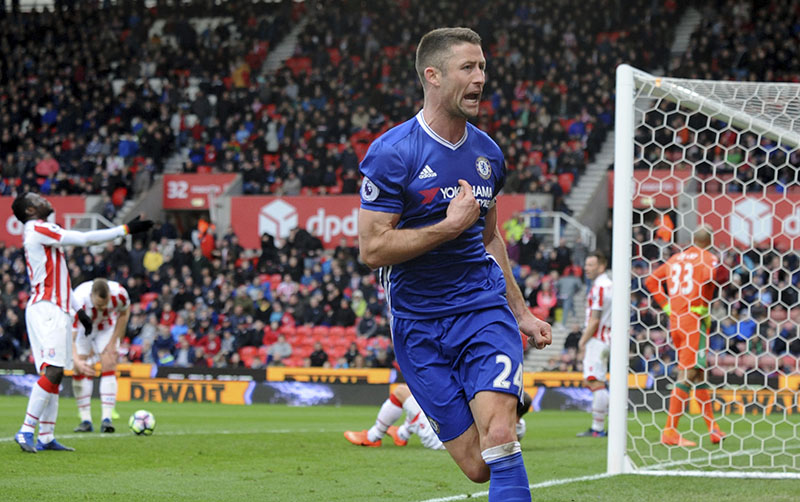 Chelsea's Gary Cahill celebrates after scoring during the English Premier League soccer match between Stoke City and Chelsea at the Britannia Stadium, Stoke on Trent, England, On Saturday, March 18, 2017. Photo: AP