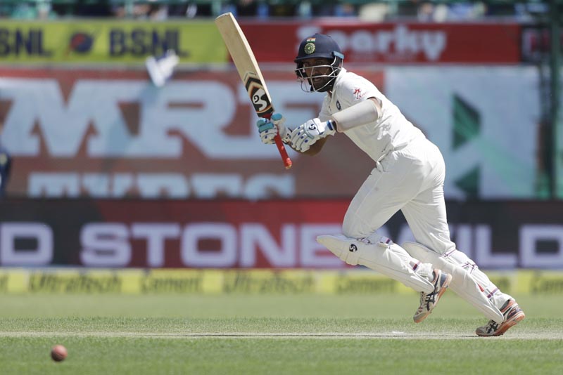 India's Cheteshwar Pujara plays a shot during the second day of their fourth test cricket match against Australia in Dharmsala, India, Sunday, March 26, 2017. Photo: AP