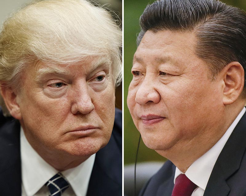 FILE - This combination of file photos shows US President Donald Trump on March 28, 2017, in Washington, left, and Chinese President Xi Jinping on Feb. 22, 2017, in Beijing. China said Thursday, March 30, 2017, Xi and Trump will meet at the latter's Florida resort on April 6-7. It will be the first in-person meeting between the two. Photo: AP