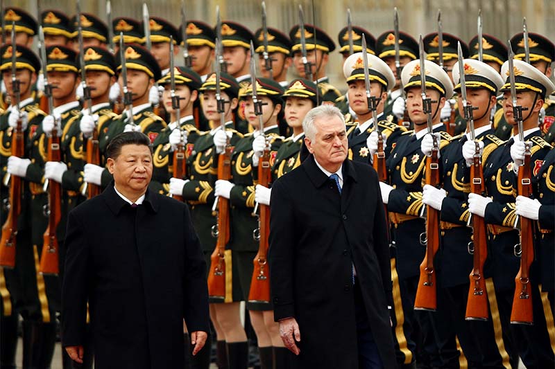 China's President Xi Jinping and Serbia's President Tomislav Nikolic inspect the honour guard during a welcoming ceremony at the Great Hall of the People in Beijing, China, on March 30, 2017.  Photo: Reuters