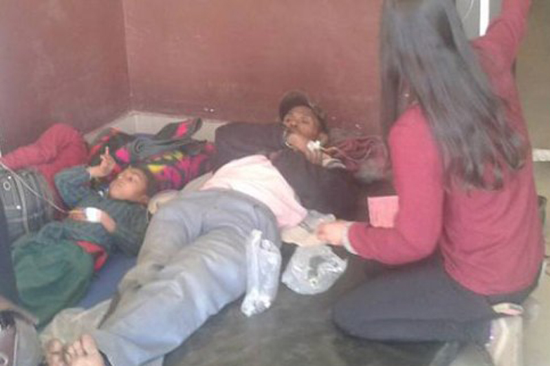 Residents of Jyamrung village, who suffer from food poisoning after consuming food at a feast, undergoing treatment at the Dhading District Hospital on Friday, March 3, 2017. Photo: Keshav Adhikari