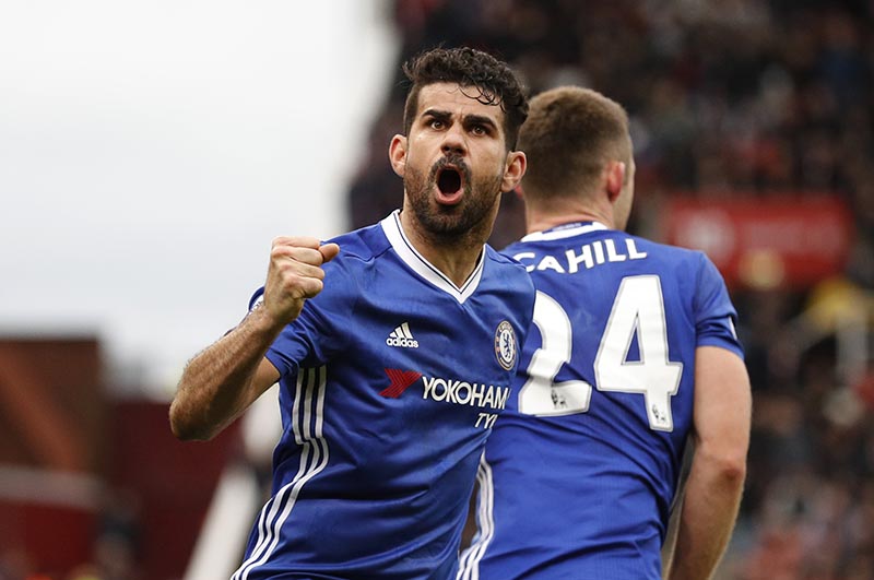 Chelsea's Gary Cahill celebrates with Diego Costa scoring their second goal. Photo: Reuters
