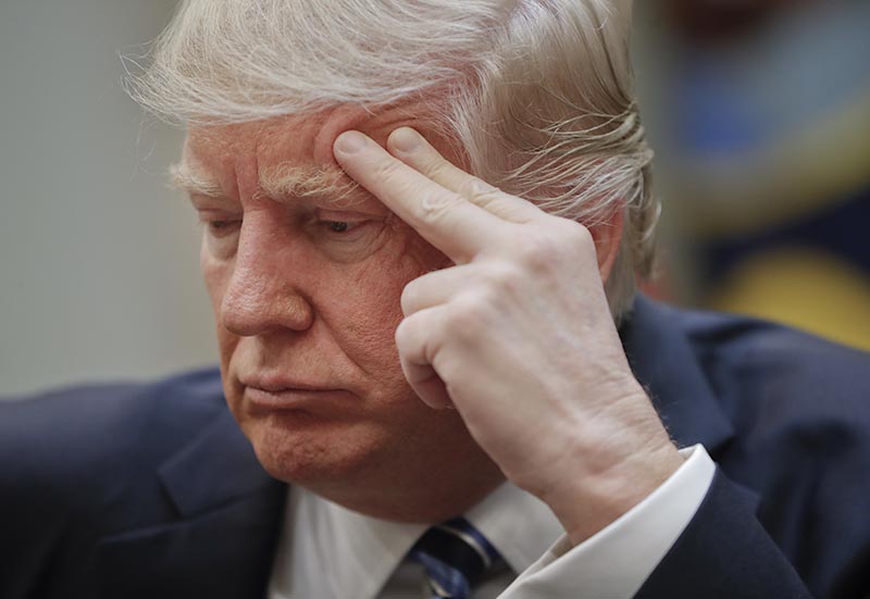 President Donald Trump listens during a meeting on healthcare in the Roosevelt Room of the White House in Washington, on Monday, March 13, 2017. Photo: AP