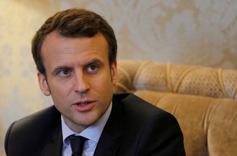 Emmanuel Macron, head of the political movement En Marche !, or Onwards !, and candidate for the 2017 French presidential election, attends a meeting about international affairs with former US Secretary of State John Kerry (not seen) in Paris, France, on March 3, 2017. Photo: Reuters