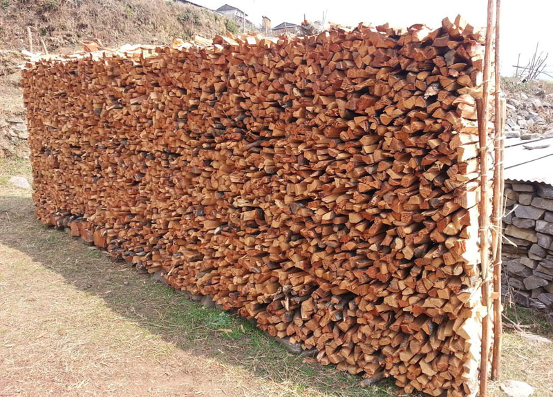 Firewood are piled in Sikles of Kaski district on Sunday, March 5, 2017. Photo: Rup Narayan Dhakal 