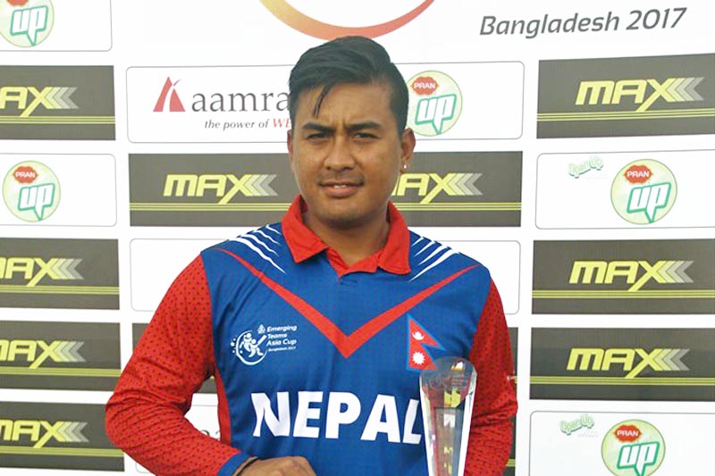 Gyanendra Malla pose for a photo after receiving Man of the Match trophy. Courtesy: Raman Shiwakoti