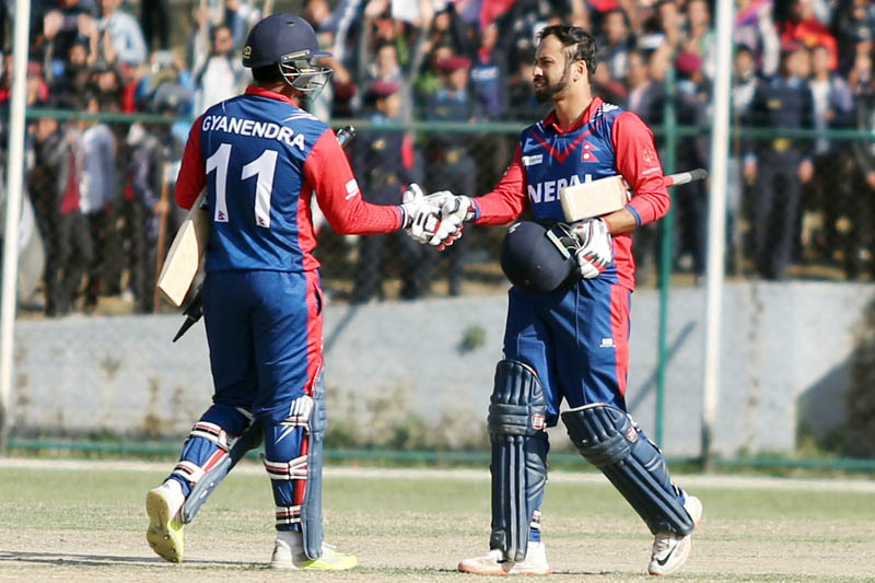 Nepal's Sharad Vesawakar shakes hand with stand-in skipper Gyanendra Malla after defeating Kenya during the ICC Cricket World League Championship at the TU Cricket Stadium, on Monday, March 13, 2017. Photo: RSS
