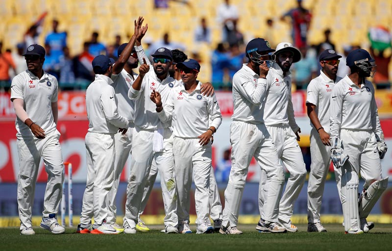 Indian players celebrate the dismissal of Australia's Shaun Marsh. Photo: Reuters