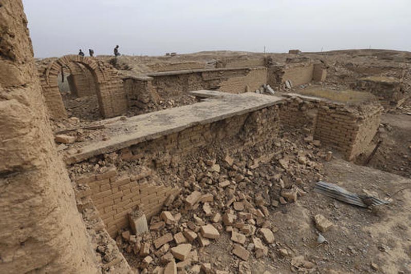 FILE - In this Wednesday, Nov. 16, 2016 file picture, journalists walk at the damaged ancient site of Nimrud, which was destroyed by the Islamic State militants, some 19 miles (30 kilometers) southeast of Mosul, Iraq. At a two-day UNESCO conference, Iraqi officials are asking for money and expertise to reclaim the cultural heritage that is on the verge of complete destruction by the Islamic State group. Photo: AP