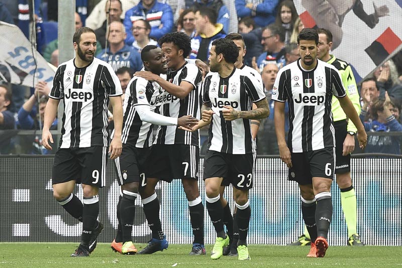 Juventus' Juan Cuadrado celebrates with teammates after scoring against Sampdoria. Photo: Reuters