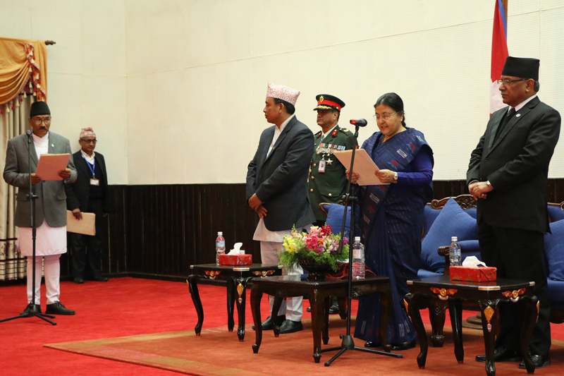 President Bidya Devi Bhandari administers the oath of office and secrecy to Deputy Prime Minister and Minister for Federal Affairs and Local Development Kamal Thapa at the Sheetal Niwas, in Kathmandu, on Thursday, March 9, 2017. Photo: RSS