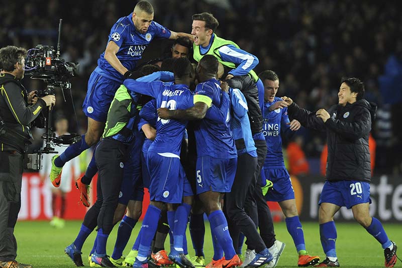 Leicester's players celebrate after the Champions League round of 16 second leg soccer match between Leicester City and Sevilla at the King Power Stadium in Leicester, England, on Tuesday, March 14, 2017. Leicester win 3-2 on aggregate. Photo: AP
