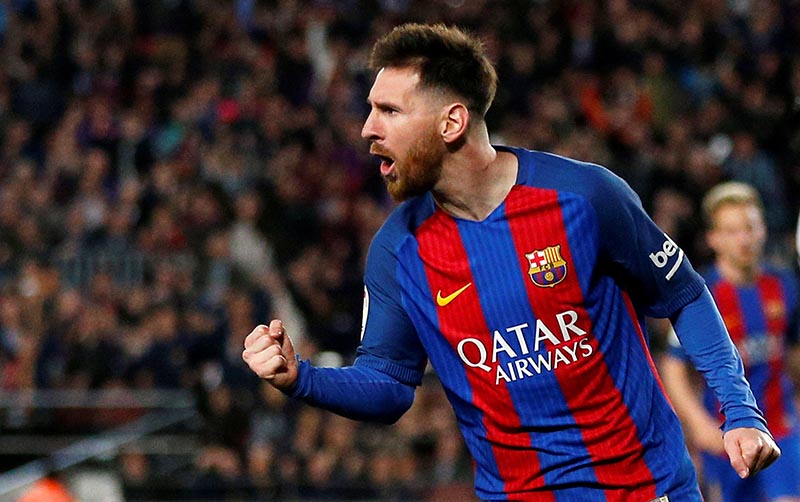 Barcelona's Lionel Messi celebrates his second goal. Photo: Reuters