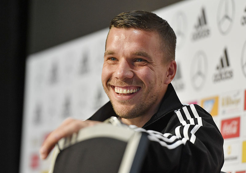 Germany's forward Lukas Podolski smiles during  a press conference prior the friendly soccer match between Germany and England in Dortmund, Germany, on Tuesday, March 21, 2017. Photo: AP