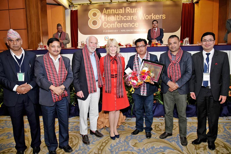 Minister for Health Gagan Kumar Thapa along with other participants poses for a photo during the 8th Annual Rural Healthcare Workers Conference in Kathmandu, on Wednesday, March 22, 2017. Photo: RSS