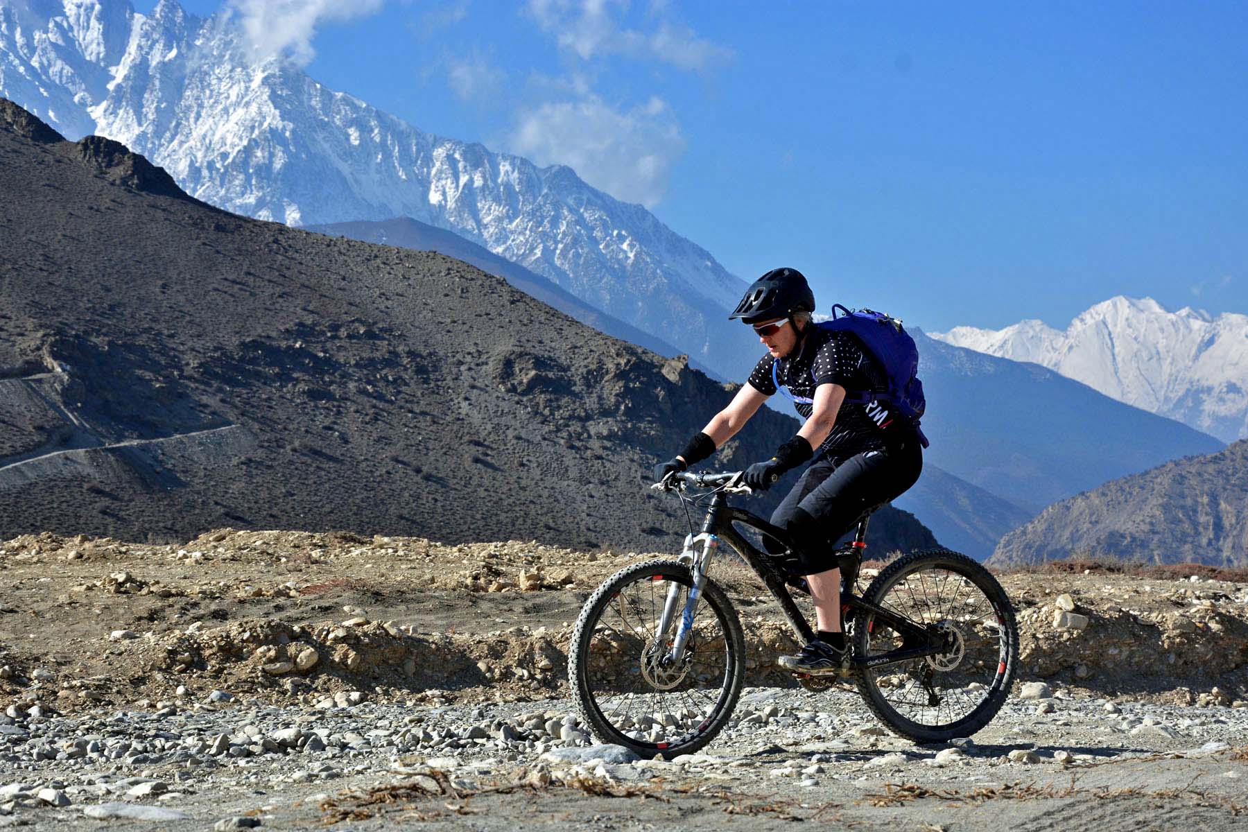 A tourist  is seen cycling in Kagbeni, Mustang on Saturday, March 25, 2017. Photo: RSS