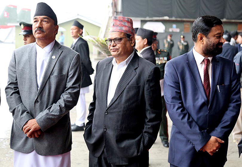 DPM Trio: Kamal Thapa, Krishna Bahadur Mahara and Bimalendra Nidhi wait to receive Prime Minister Pushpa Kamal Dahal at the Tribhuvan International Airport on Wednesday, March 29, 2017. Photo: RSS