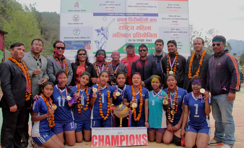 New Diamond Academy players and officials celebrate after winning the first Didibahini Cup Womenu2019s Volleyball Tournament in Kushma, Parbat on Sunday, March 12, 2017. Photo: THT