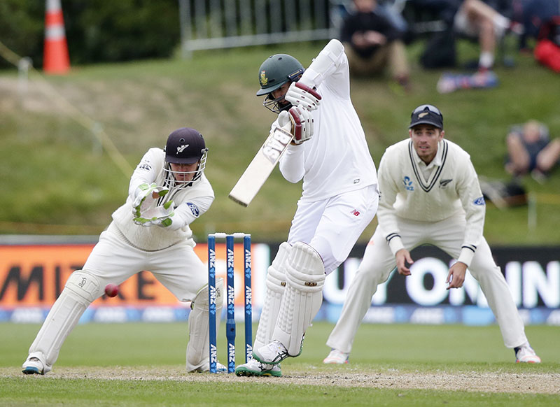 South Africa's Hashim Amla plays a shot as New Zealand's BJ Watling watches during the first cricket test at University Oval, Dunedin, New Zealand, on Friday, March 10, 2017. Photo: AP