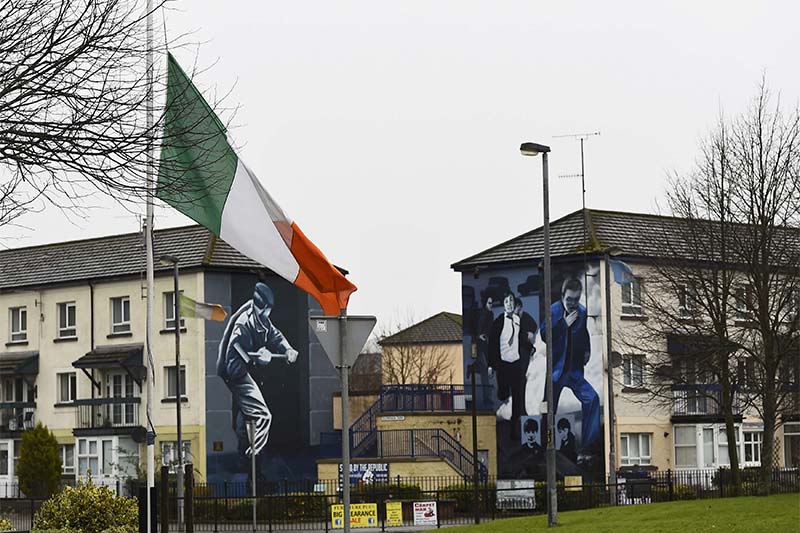 The Irish flag flies at half-mast after the death of Martin McGuinness, in the Bogside area of Londonderry, Northern Ireland, on March 21, 2017. Photo: Reuters