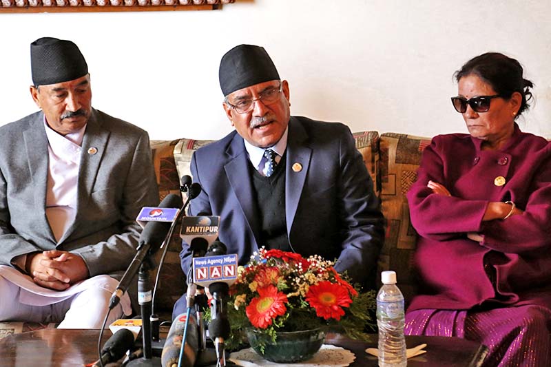 Prime Minister Pushpa Kamal Dahal (centre) interacts with the media after he arrives in Nepal after his week-long visit from China, in Kathmandu, on Wednesday, March 29, 2017. Photo: RSS