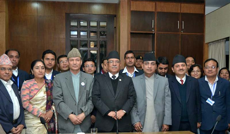 Prime Minister Pushpa Kamal Dahal with a team of the National Information Commission at his residence in Baluwatar, on Thursday, March 9, 2017. Photo Courtesy: PM's Secretariat