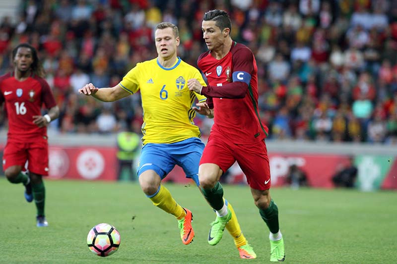 Portugal's Cristiano Ronaldo in action against Sweden's Viktor Claesson in their international friendly match at the Barreiros stadium, Funchal, Portugal on Marc 28, 2017. Photo: Reuters