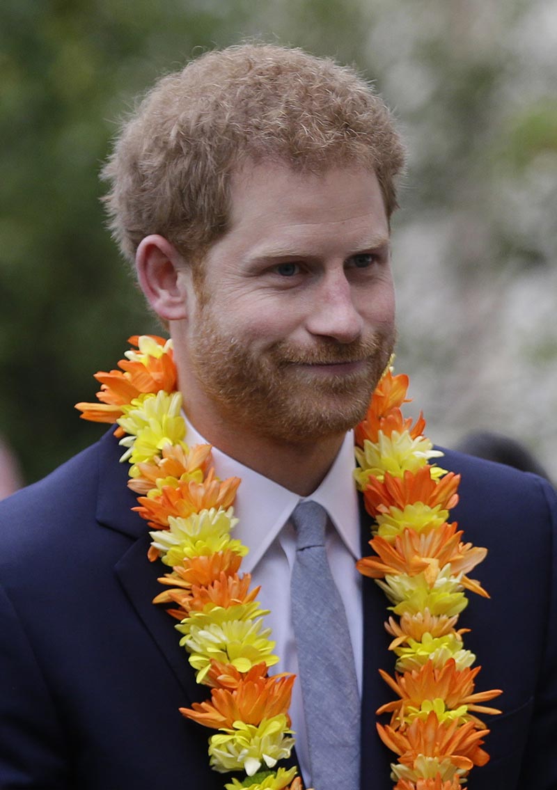 Prince Harry smiles wearing a garland as he arrives at the Embassy of Nepal in London, on Monday, March 20, 2017. Harry attended a Ceremony at the Embassy of Nepal to mark the conclusion of celebrations for the bicentenary of bilateral relations between the United Kingdom and Nepal. Photo: AP