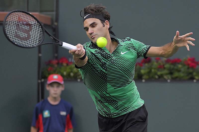 Roger Federer of Switzerland returns a shot against Steve Johnson at the BNP Paribas Open tennis tournament, in Indian Wells, California, on Tuesday, March 14, 2017. Photo: AP