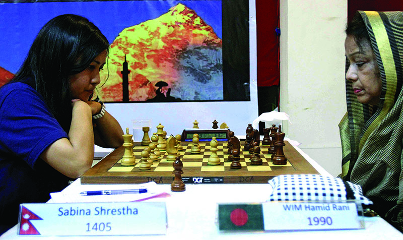 Nepalu2019s Sabina Shrestha (left) and WIM Hamid Rani of Bangladesh ponder their moves during their Asian Zonal 3.2 Chess Championship match in Kathmandu on Saturday, March 25, 2017. Photo: THT