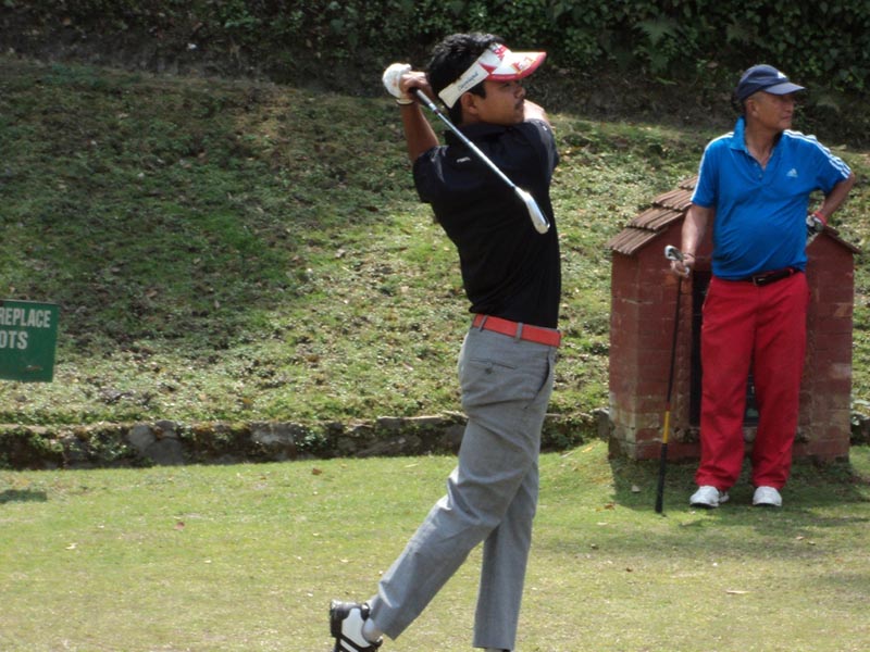 Nepalu2019s Shiva Kumar Majhi plays a shot during the second round of the Nepal Open Amateur Golf Championship at the Gokarna Golf Club in Kathmandu on Wednesday, March 22, 2017. Photo: THT