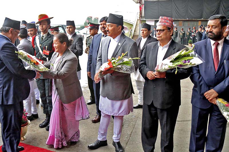 Speaker Onsari Gharti Magar welcomes Prime Minister Pushpa Kamal Dahal (left) as he arrives at the Tribhuvan International Airport after his week-long visit from China, in Kathmandu, on Wednesday, March 29, 2017. Photo: RSS