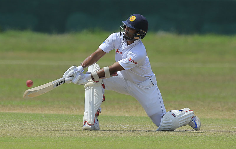 Sri Lanka's Cricket Presidents' XI batsman Dinesh Chandimal plays a shot against Bangladesh during their practice match in Moratuwa on the out skirts of Colombo, Sri Lanka, on Friday, March 3, 2017. Photo: AP