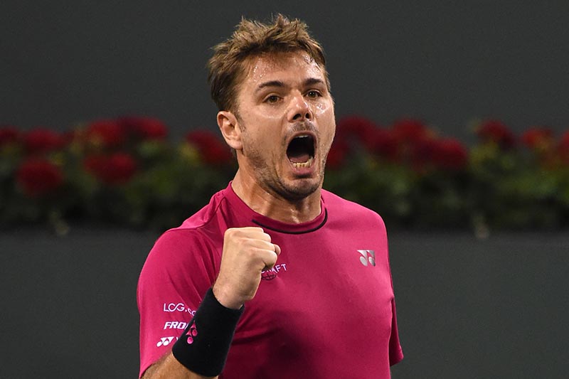 Mar 16, 2017; Indian Wells, CA, USA; Stan Wawrinka (SUI) celebrates at match point as he defeated Dominic Theim (AUT) in the quarter final match in the BNP Paribas Open at the Indian Wells Tennis Garden. Photo: Reuters