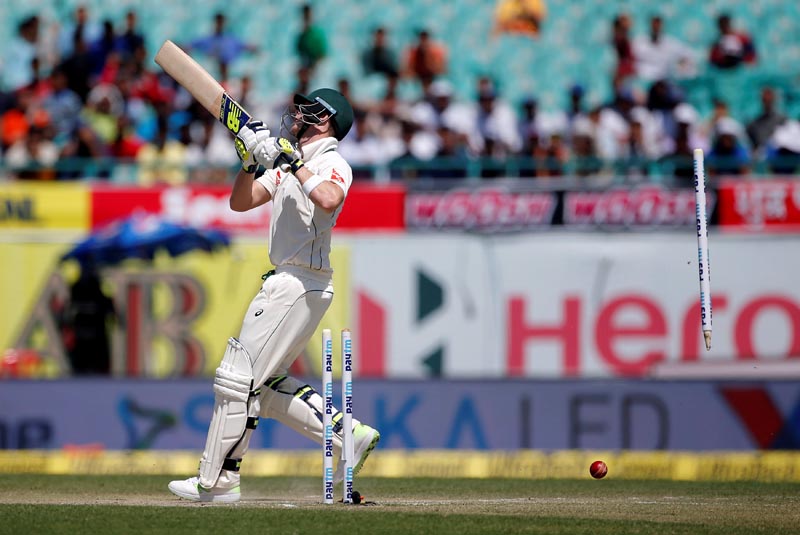 Australia's captain Steven Smith is clean bowled by India's Bhuvneshwar Kumar. Photo: Reuters