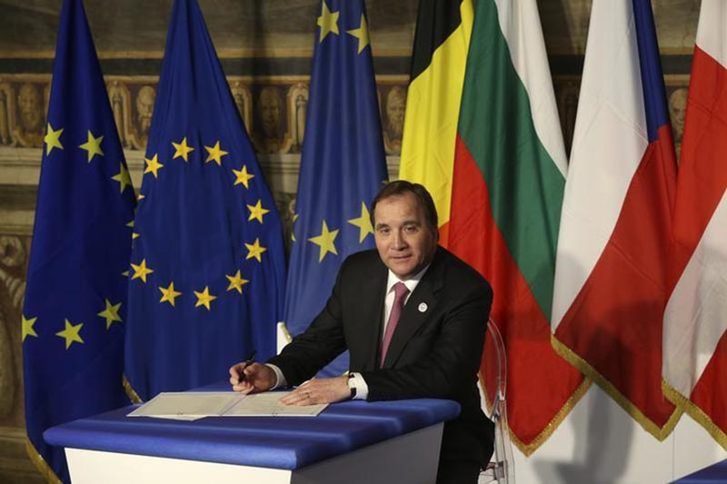 File: Sweden's Prime Minister Stefan Lofven prepares to sign a document during the EU leaders meeting on the 60th anniversary of the Treaty of Rome, in Rome, Italy March 25, 2017. Photo: Reuters