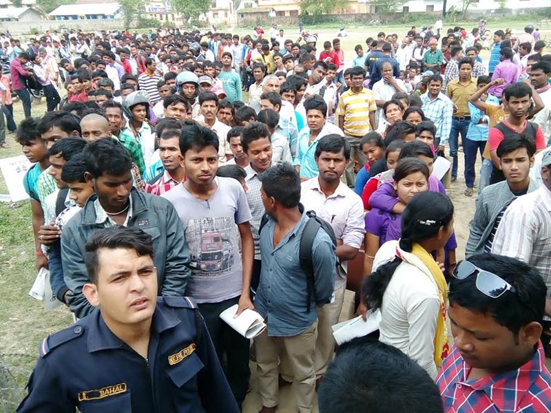 Youth gathering to fill forms for temporary police posts for the upcoming local level elections, in District Police Office, Rautahat, on Wednesday, March 29, 2017. Photo: THT