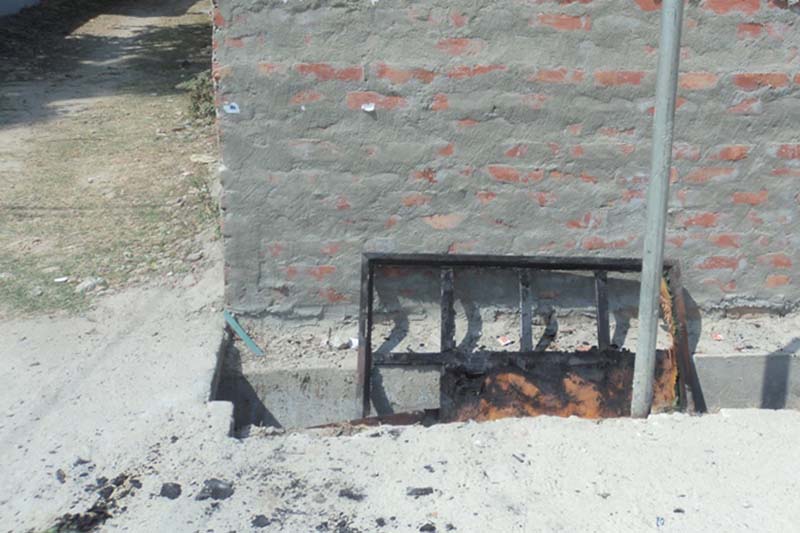 UDMF cadres vandalised CPN-UML's office in Rajbiraj and burnt a signboard. Photo: Byas Shankhar Upadhyaya/THT