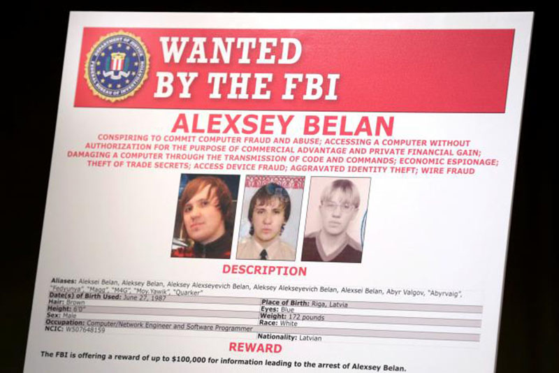 A poster of suspected Russian hackers is seen before FBI National Security Division and the US Attorney's Office for the Northern District of California joint news conference at the Justice Department in Washington, US, on March 15, 2017. Photo: REUTERS.