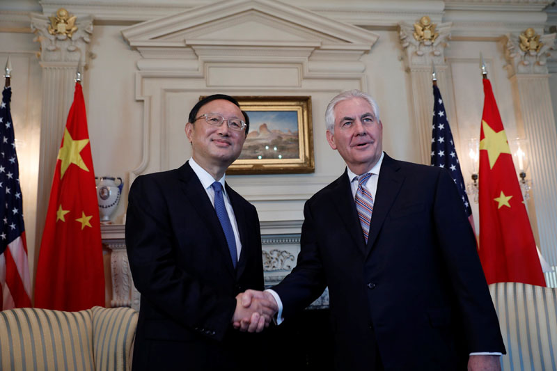 Secretary of State Rex Tillerson greets Chinese State Councilor Yang Jiechi at the State Department in Washington, US, on February 28, 2017. Photo: Reuters