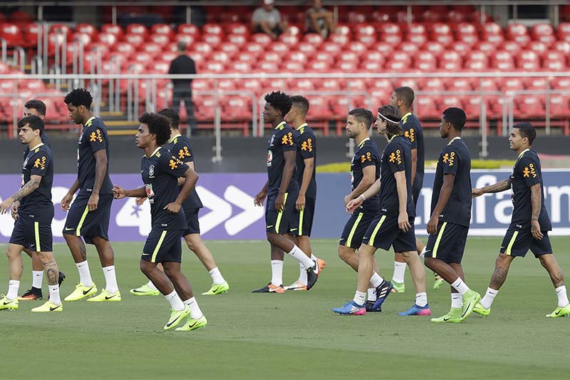 Players of Brazil national team walk on the field during a training session in Sao Paulo, Brazil, on Saturday, March 25, 2017. Photo: AP