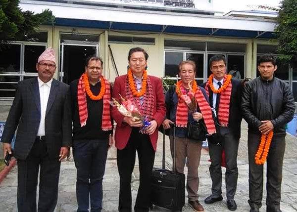 Former Japanese PM Yukio Hatoyama (2nd from left) at Pokhara Airport. Photo: THT Onlinen