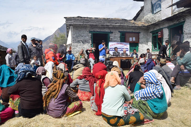 Locals gather to attend a public hearing programme at Bim VDC in Myagdi district, on Friday, March 10, 2017. Photo: RSS