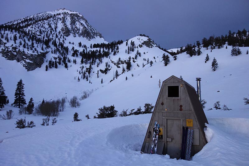 Skis rest against the side of the Onion Valley snow survey cabin in Inyo National Forest, near Independence, California, on March 30, 2017. Photo: AP