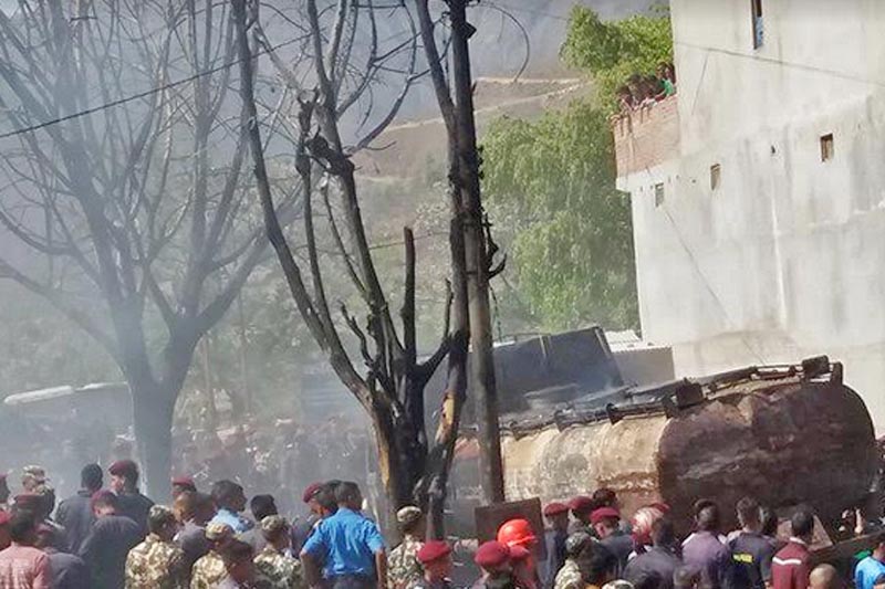 A concerted effort to douse fire at Pipalla of Dipayal in Doti on Sunday, April 2 2017: Photo Tekendra Deuba