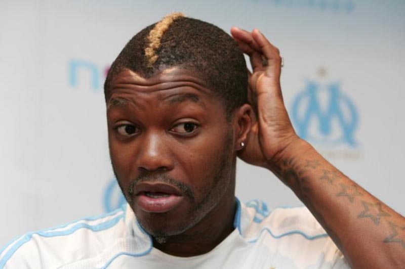 File - French striker Djibril Cisse attends a news conference in Marseille, France, on July 12, 2006. Photo: Reuters