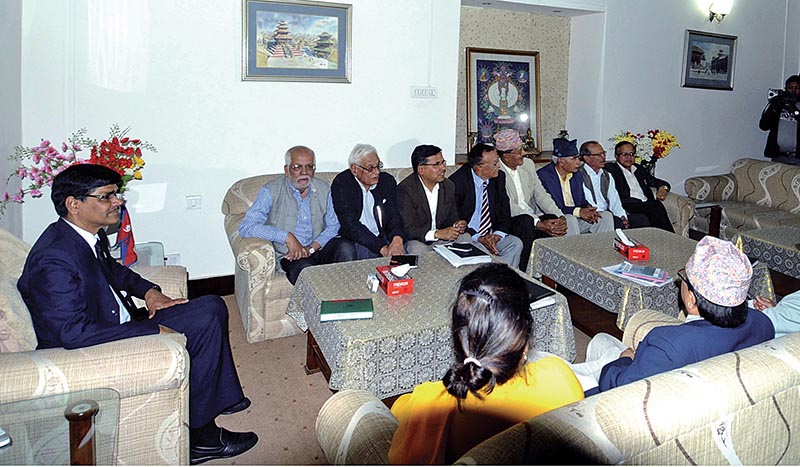 Chief Election Commissioner Ayodhi Prasad Yadav (left) holding a meeting with former chief election commissioners and civil society members, in Kathmandu, on Thursday, April 27, 2017. Photo: RSS