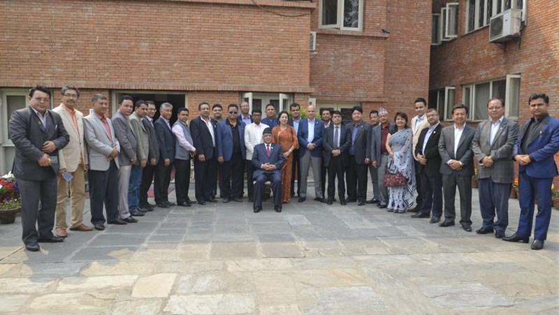 Prime Minister Pushpa Kamal Dahal with the newly elected office bearers of Federation of Nepalese Chamber of Commerce and Industries in  Baluwatar on April 13, 2017. Photo: PM's Secretariat