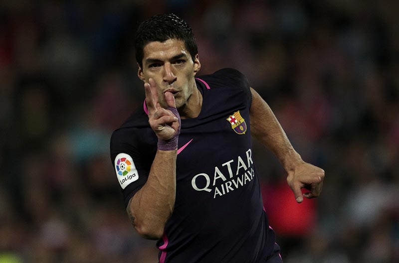 Barcelona's Luis Suarez celebrates after scoring a goal. Photo: Reuters