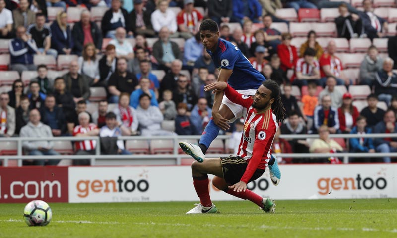 Manchester United's Marcus Rashford scores their third goal. Photo: Reuters